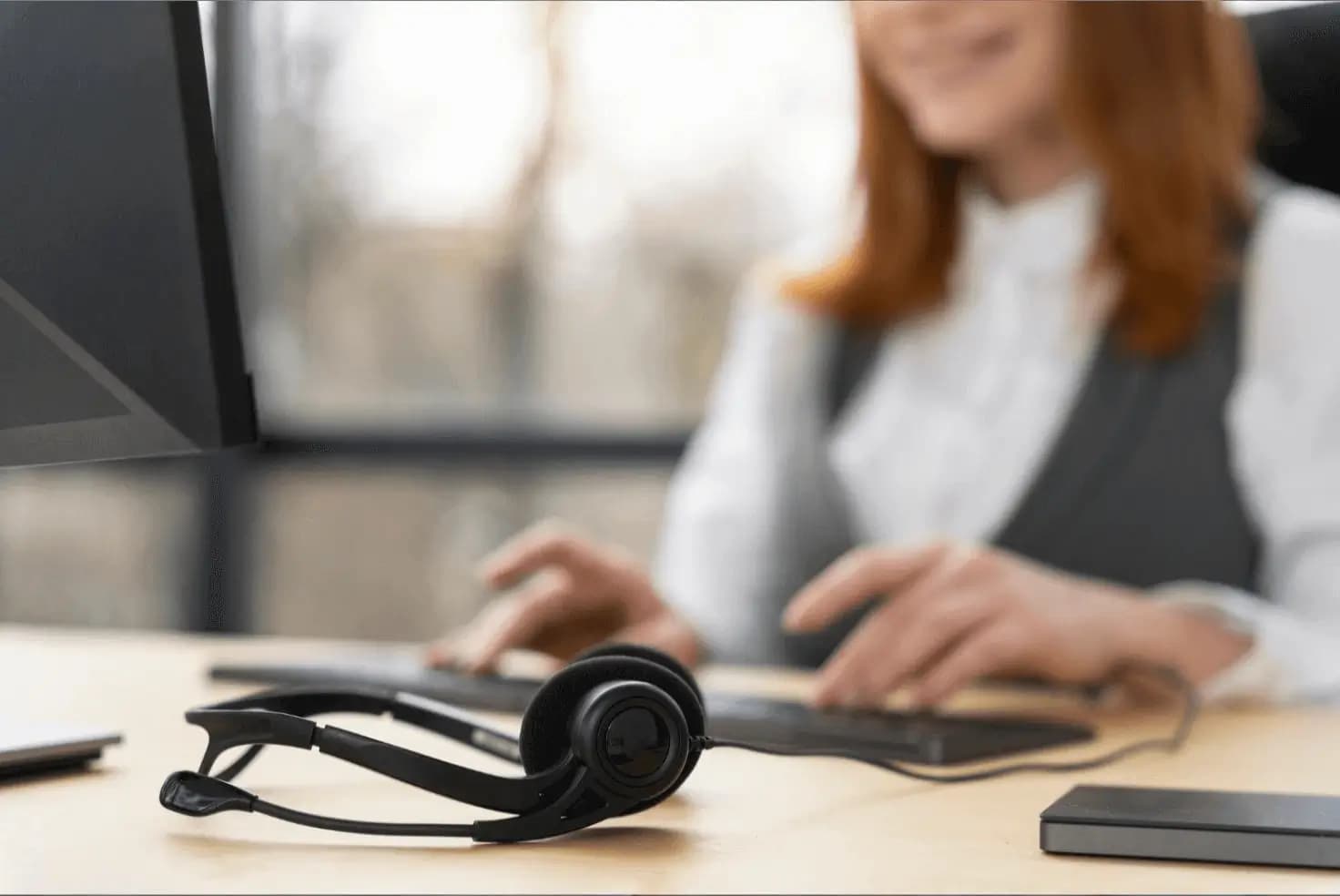 Customer service agent with headset