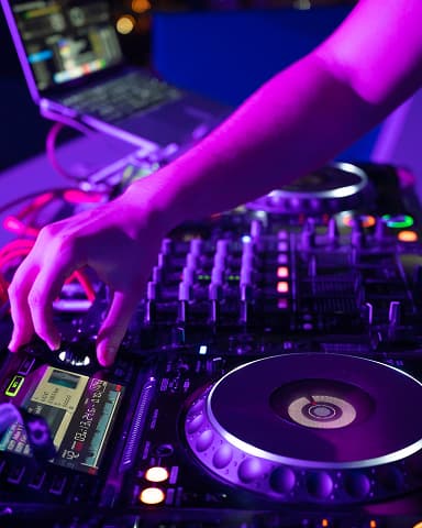 DJ mixing tracks at an event
